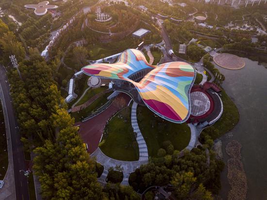 Aerial photo taken on Oct. 7, 2019 shows the Guirui Theater at the International Horticultural Exhibition in Yanqing District of Beijing, capital of China. The 2019 Beijing International Horticultural Exhibition will be closed on Oct. 9. Since its opening in April, the expo has held 3,284 events, attracting 9.34 million visitors. (Xinhua/Cai Yang)