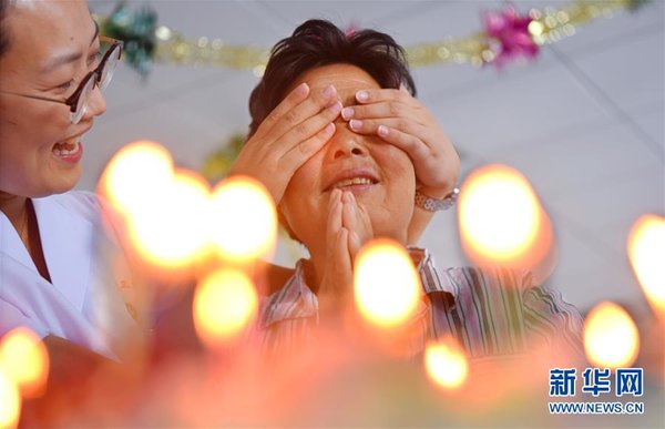 Female Medics in E China Bring Warmth to Mentally-impaired Patients