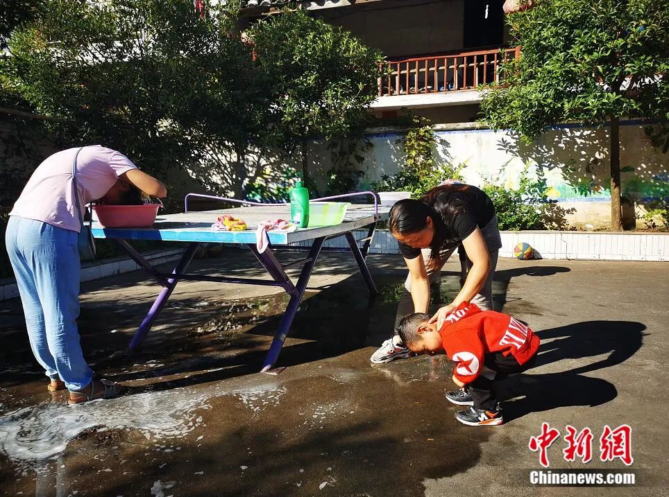 Devoted Chinese village teachers double up as parents for students