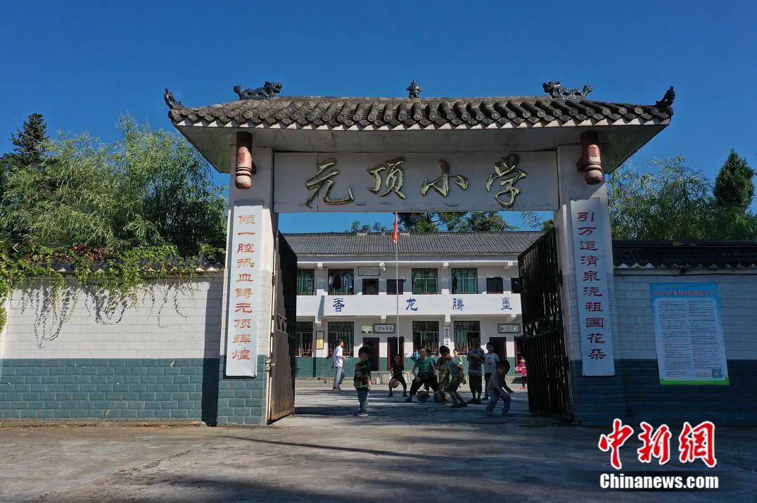 Devoted Chinese village teachers double up as parents for students